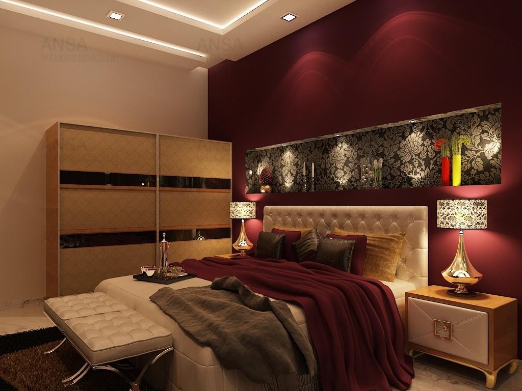 indian bedroom with traditional motifs on wall