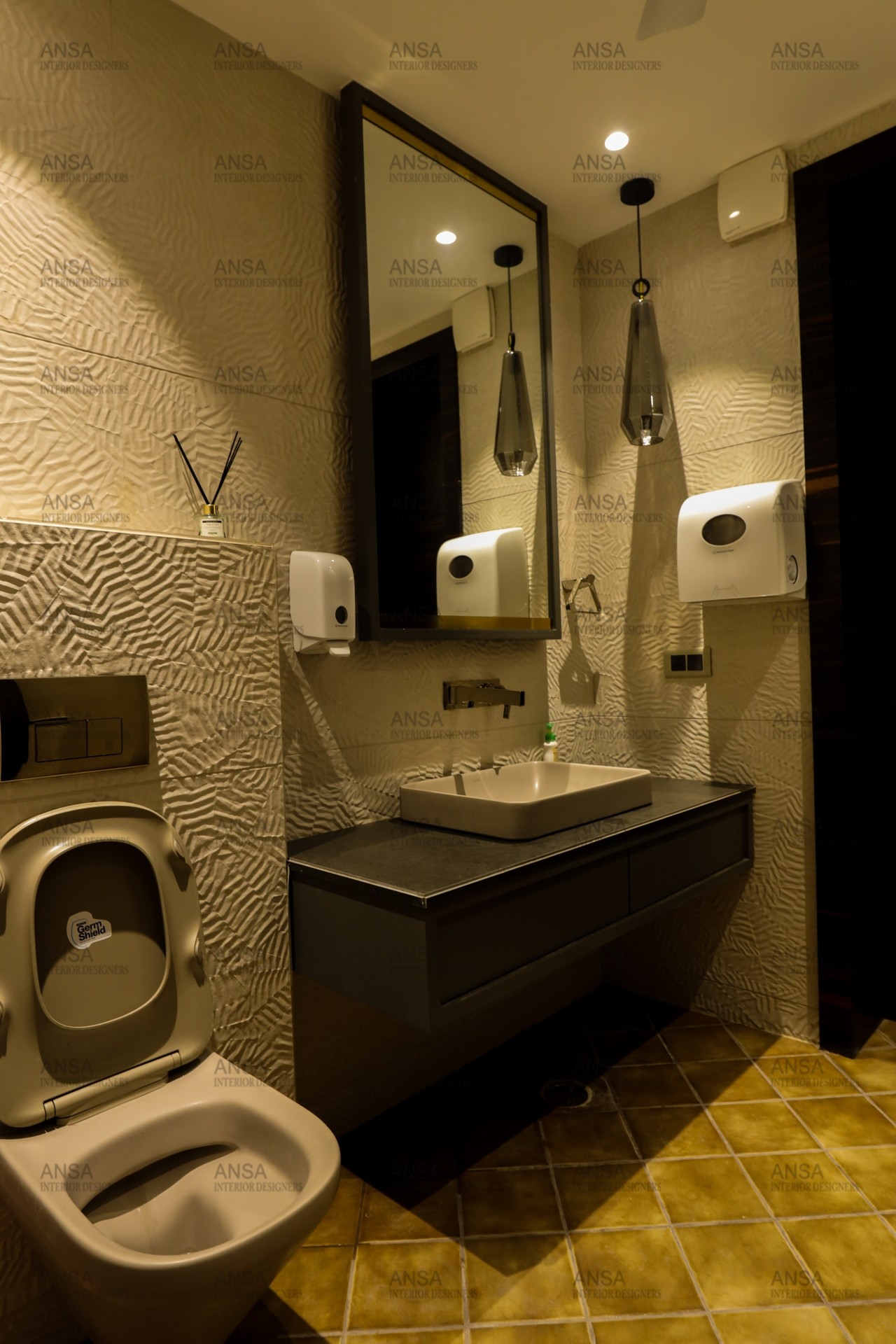 bathroom in an office designed by ansa interiors